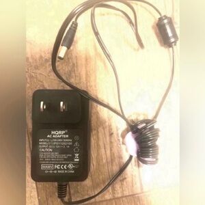 AC Adapter Adapter HQRP®
AC ADAPTER MODEL: PSY12021004
INPUT: 100-240V 50/60Hz